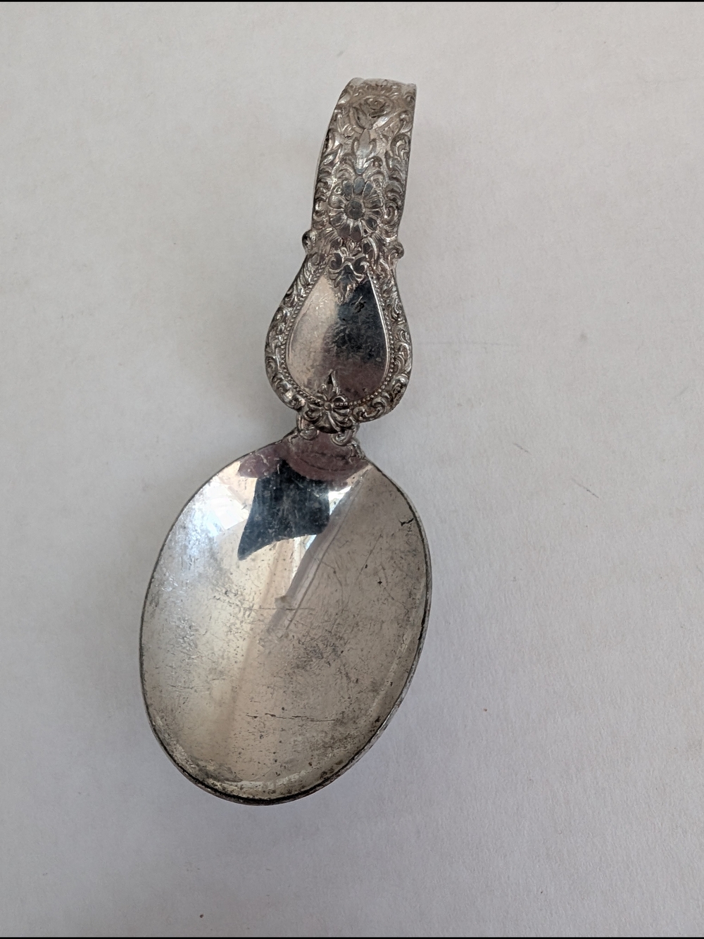 Vintage English Pewter Curved Baby Spoon Ornate Floral Repousse Loop Handle 0.9